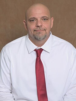 Staff member Chris Pullens from a56b579fd44e