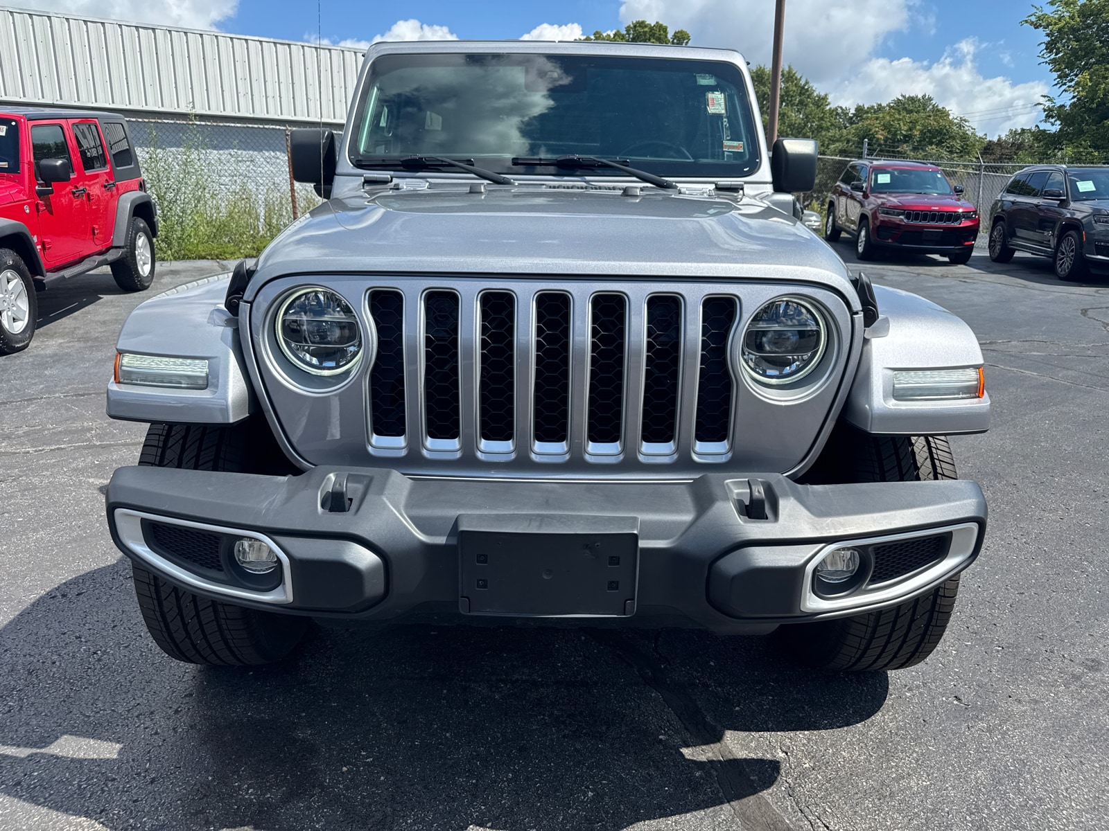 Used 2021 Jeep Wrangler Unlimited Sahara 4XE with VIN 1C4JJXP62MW730483 for sale in Kansas City