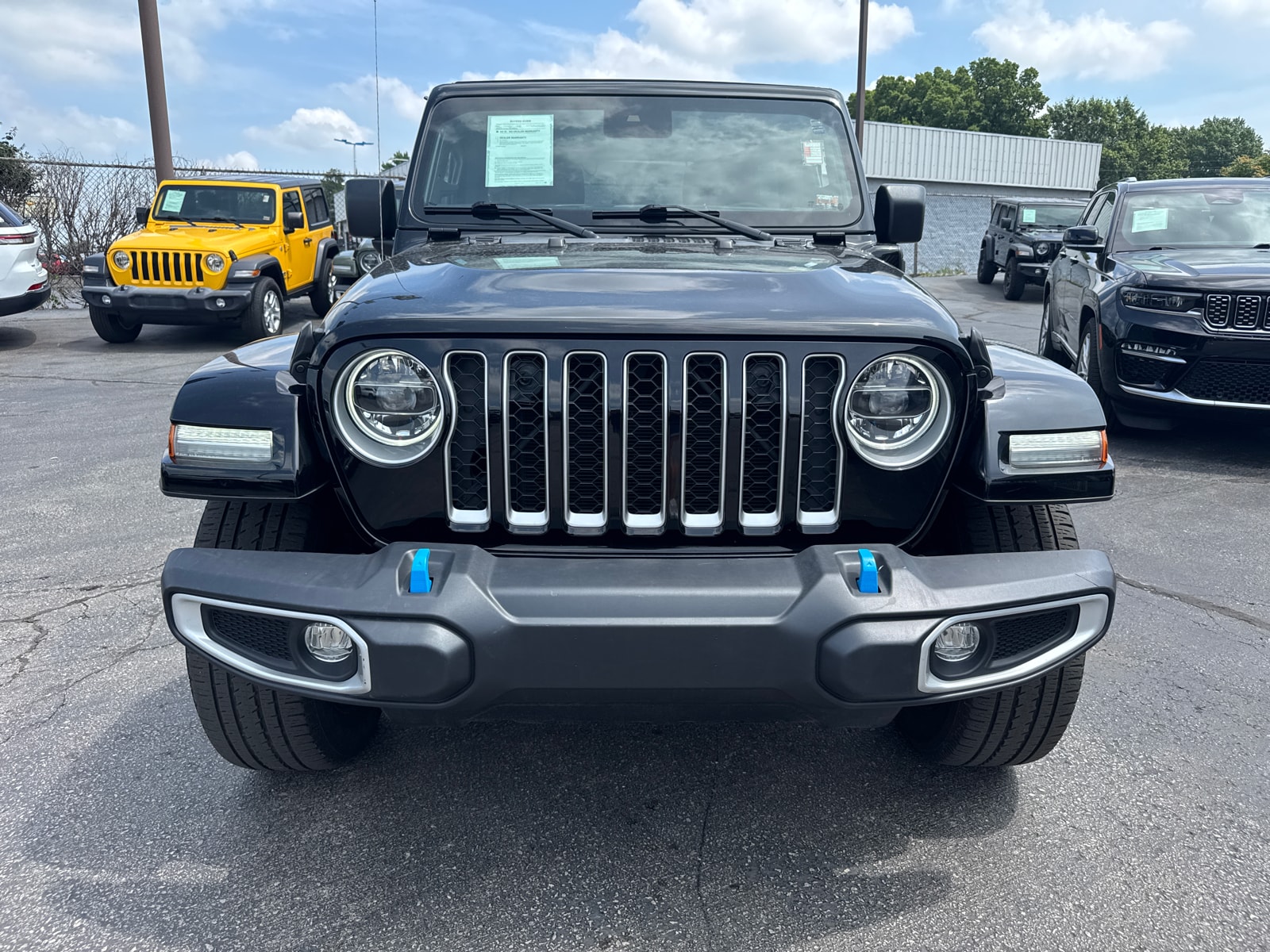 Used 2022 Jeep Wrangler Unlimited Sahara 4XE with VIN 1C4JJXP61NW117871 for sale in Kansas City