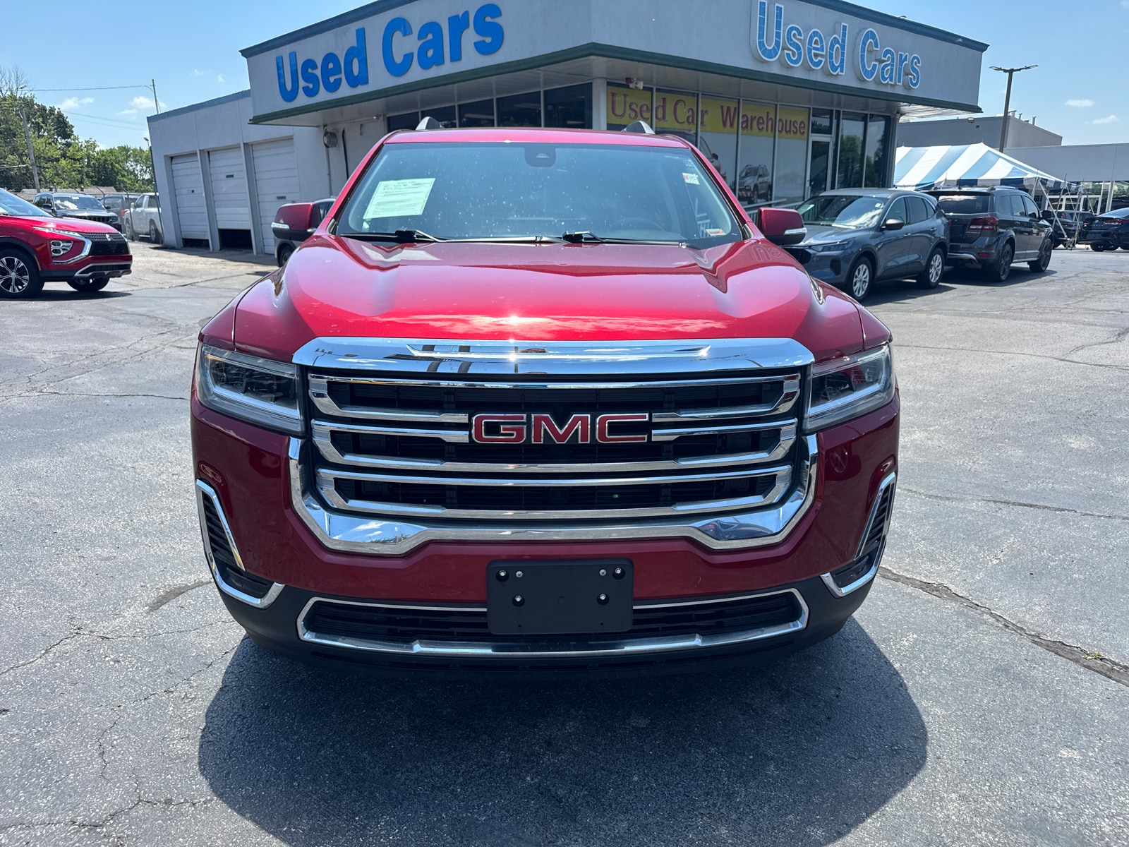 Used 2023 GMC Acadia SLE with VIN 1GKKNRL47PZ117145 for sale in Kansas City