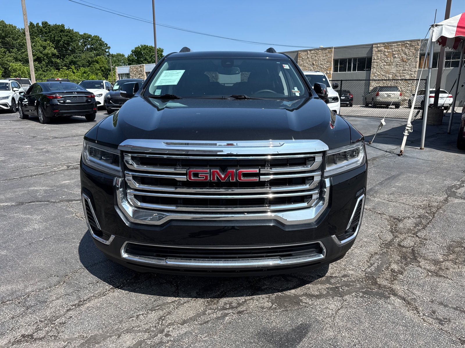 Used 2023 GMC Acadia SLT with VIN 1GKKNUL43PZ253288 for sale in Kansas City