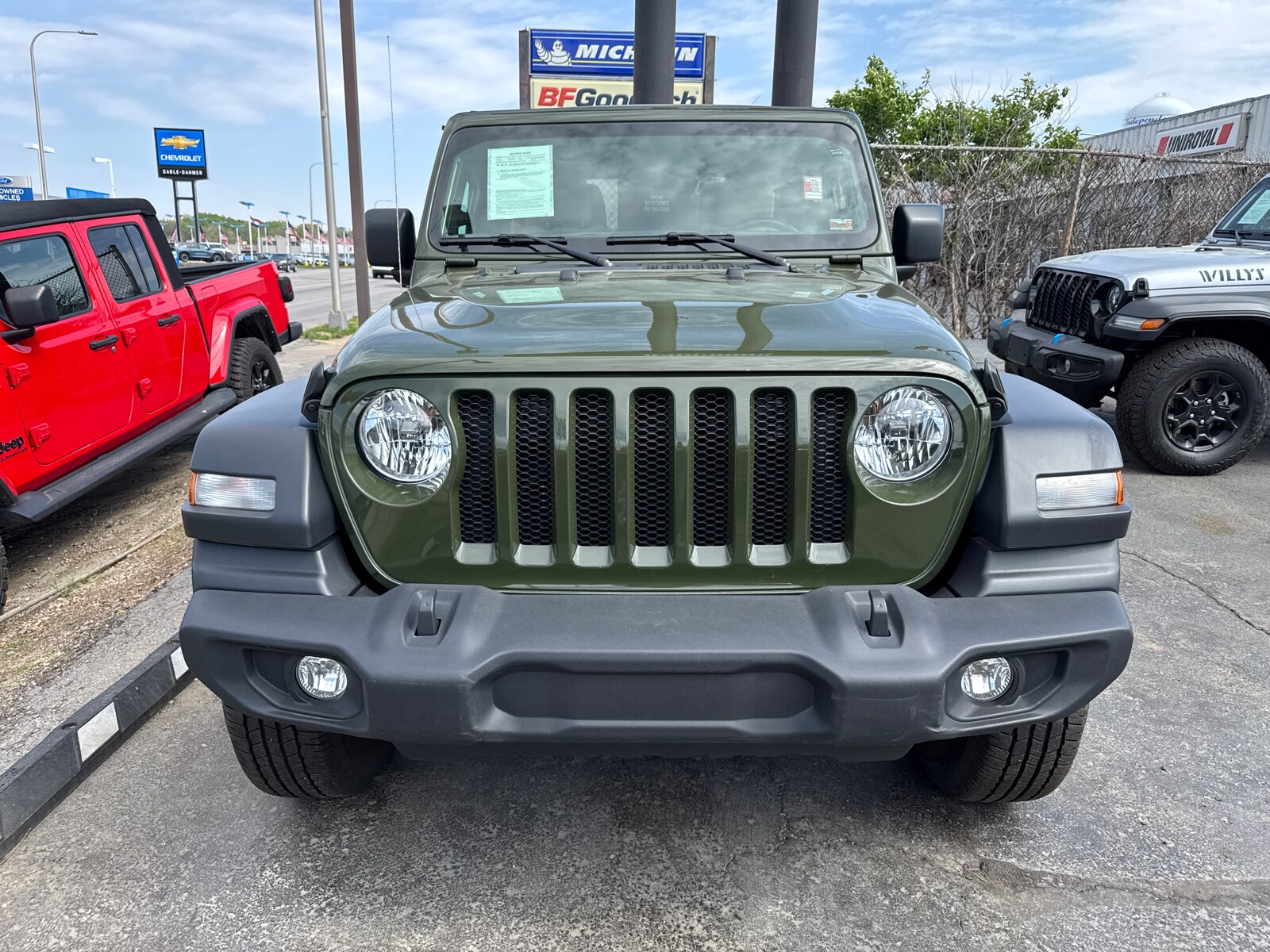 Used 2023 Jeep Wrangler 4-Door Sport S with VIN 1C4HJXDG5PW652670 for sale in Kansas City