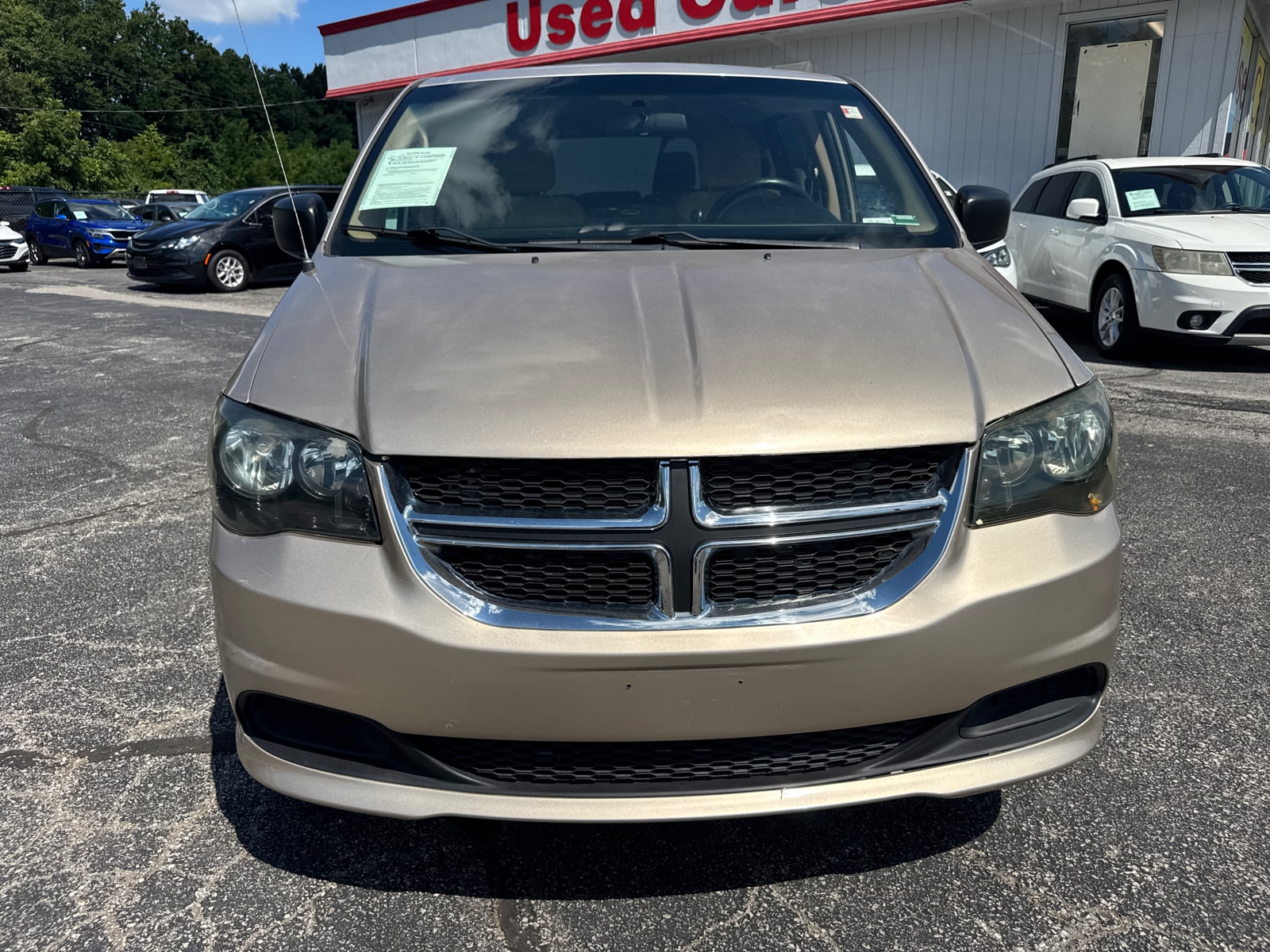 Used 2015 Dodge Grand Caravan SE with VIN 2C4RDGBG9FR542730 for sale in Independence, MO