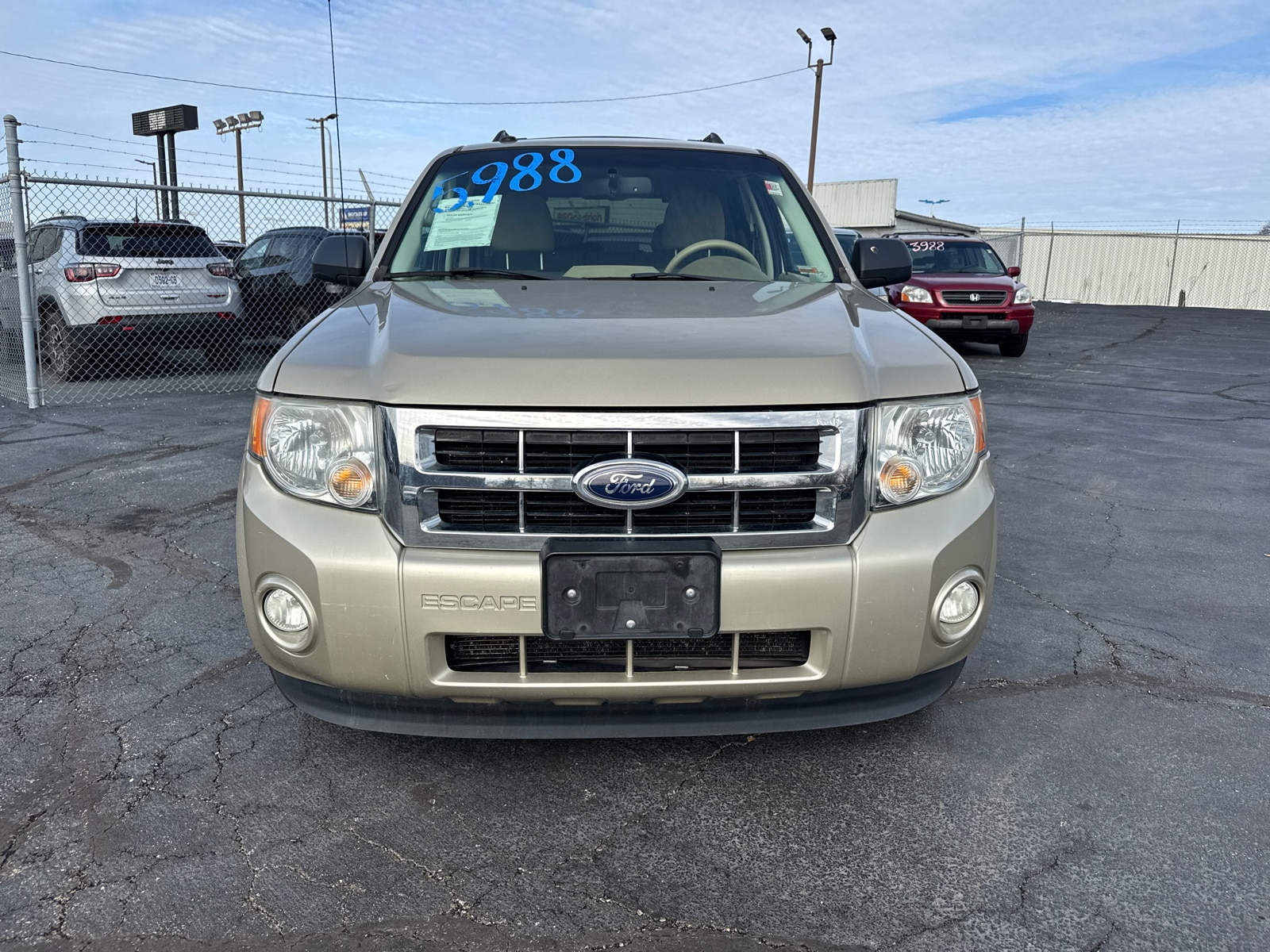 Used 2012 Ford Escape XLT with VIN 1FMCU0DG2CKB30911 for sale in Kansas City