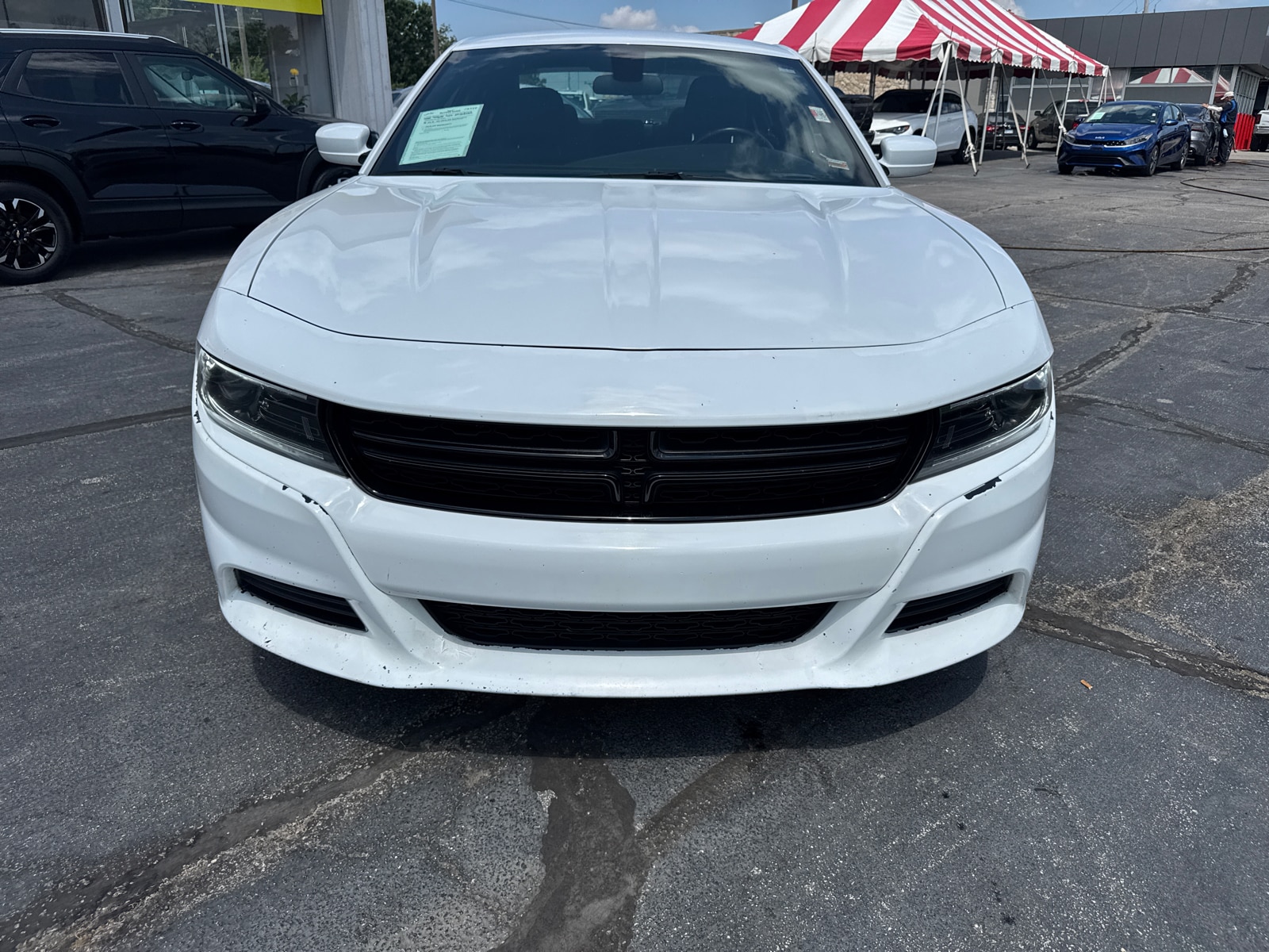 Used 2022 Dodge Charger SXT with VIN 2C3CDXBG9NH208065 for sale in Kansas City