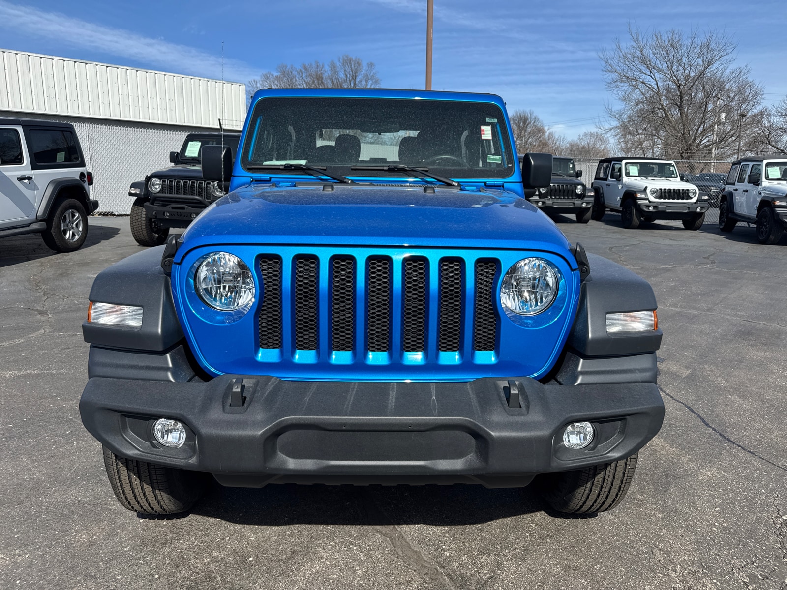 Used 2023 Jeep Wrangler 2-Door Sport with VIN 1C4GJXAG3PW647502 for sale in Kansas City
