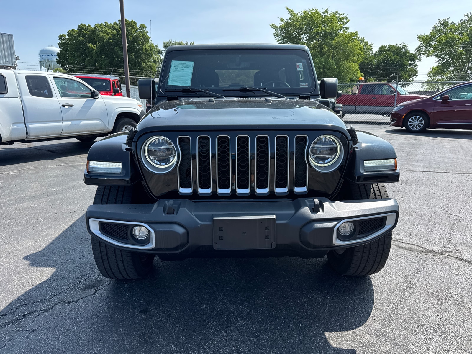 Used 2021 Jeep Wrangler Unlimited Sahara 4XE with VIN 1C4JJXP61MW839310 for sale in Kansas City