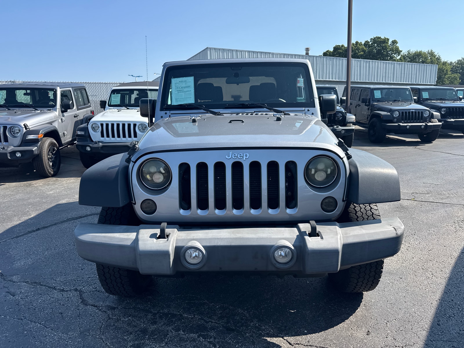 Used 2017 Jeep Wrangler Sport with VIN 1C4AJWAG6HL563936 for sale in Kansas City