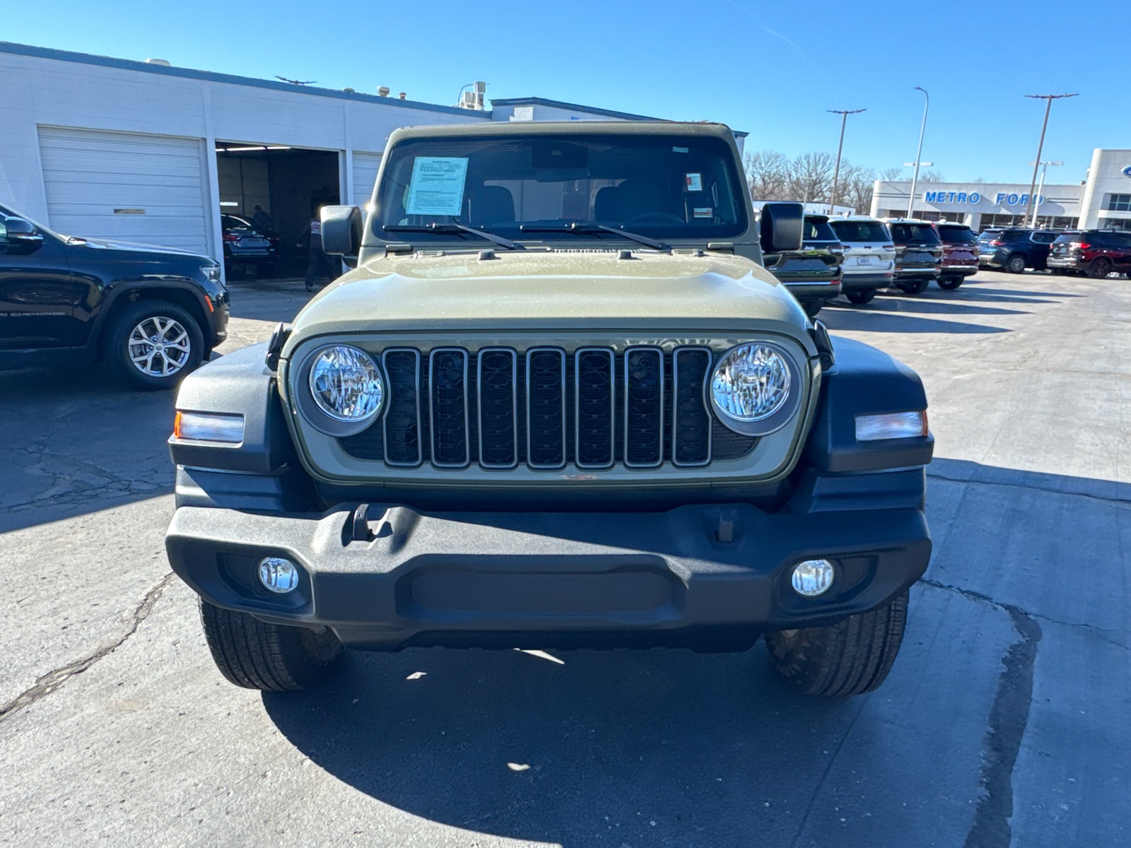 Used 2025 Jeep Wrangler 2-Door Sport S with VIN 1C4PJXAN5SW508334 for sale in Kansas City