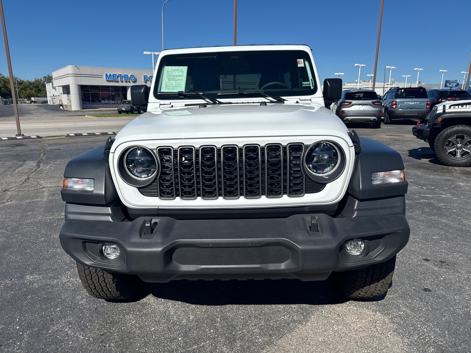 Used 2026 Jeep Wrangler 4-Door Sport S with VIN 1C4PJXDG6TW168447 for sale in Kansas City