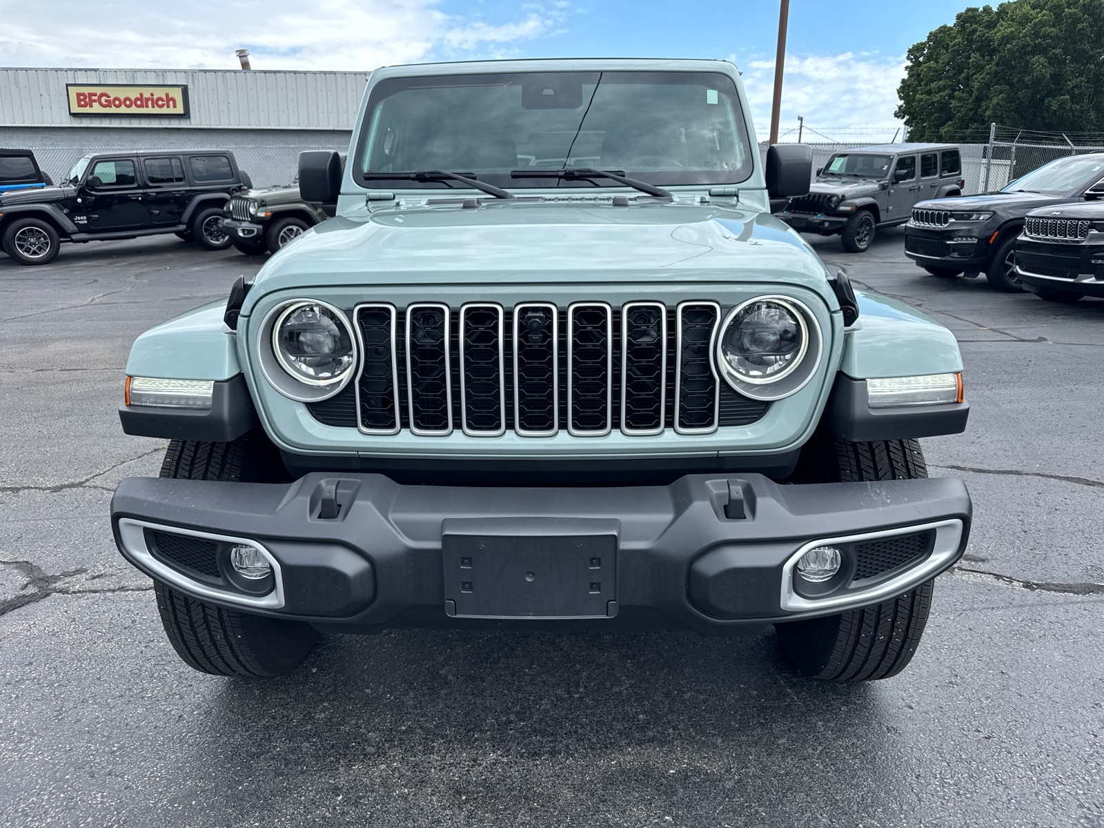 Used 2024 Jeep Wrangler 4-Door Sahara with VIN 1C4PJXEGXRW200839 for sale in Kansas City