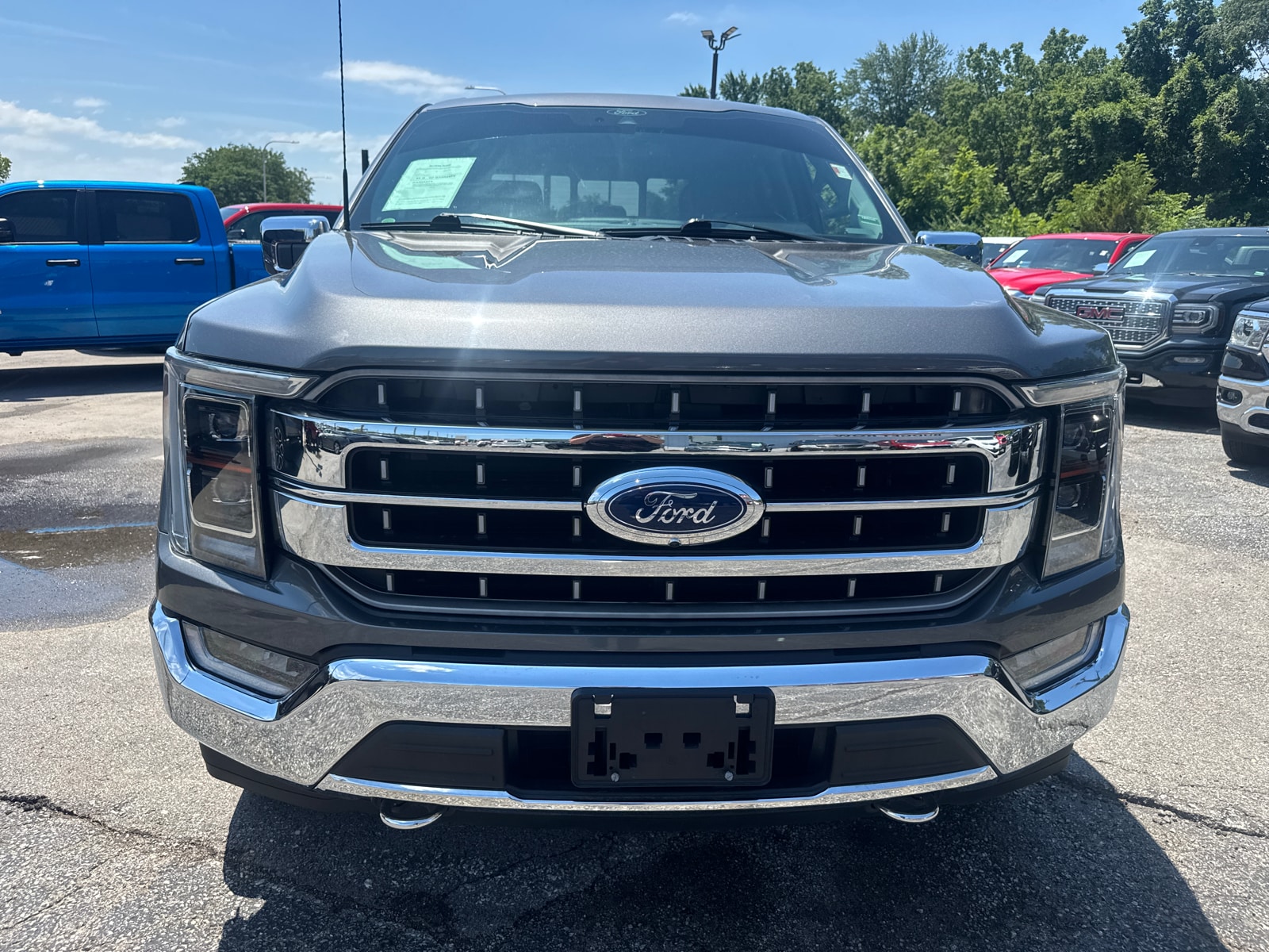 Used 2021 Ford F-150 Lariat with VIN 1FTFW1E80MFC01669 for sale in Kansas City