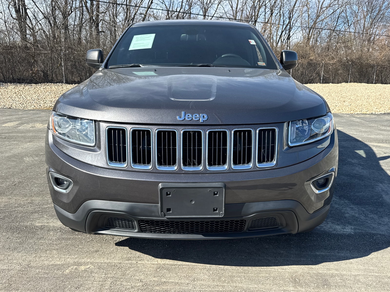 Used 2015 Jeep Grand Cherokee Laredo E with VIN 1C4RJEAG0FC218945 for sale in Kansas City