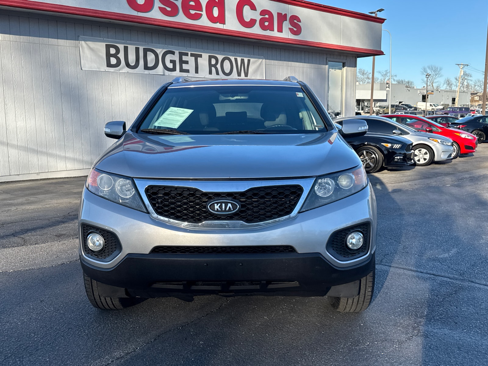Used 2013 Kia Sorento LX with VIN 5XYKT3A61DG394256 for sale in Kansas City