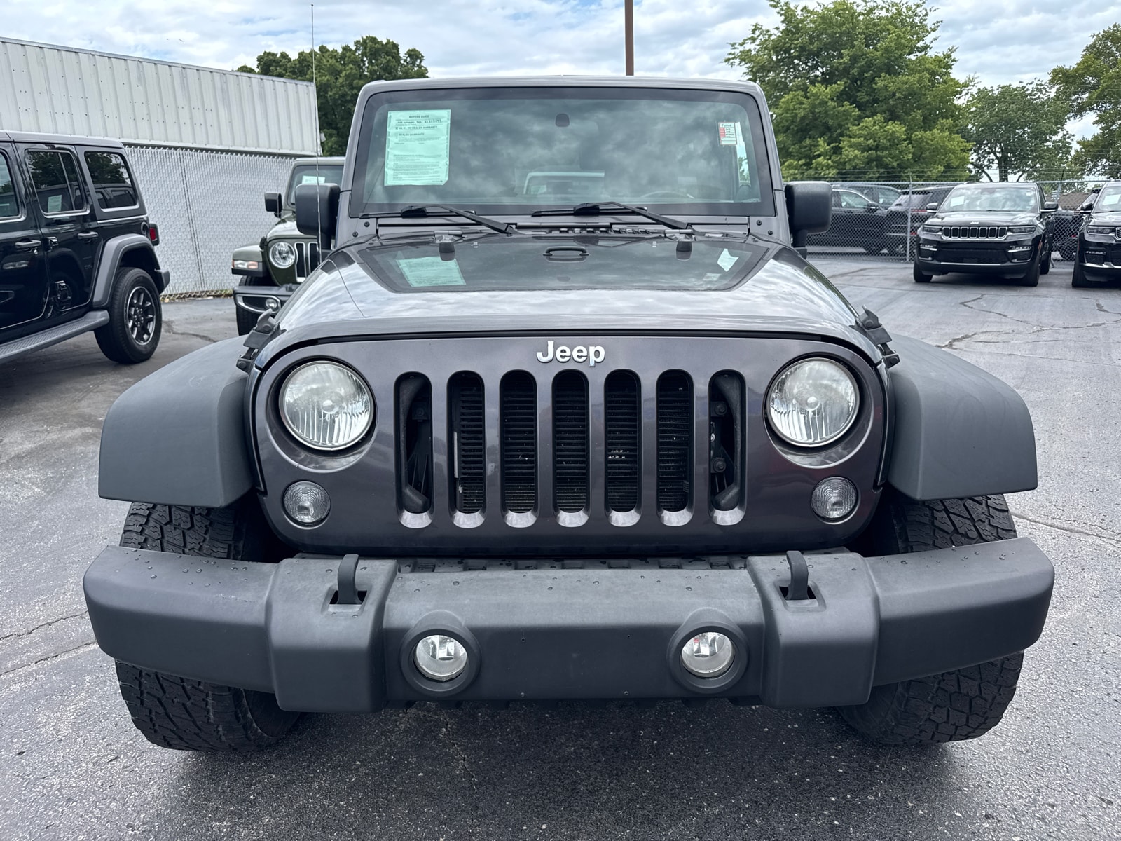 Used 2014 Jeep Wrangler Unlimited Sport with VIN 1C4BJWDG6EL255497 for sale in Kansas City