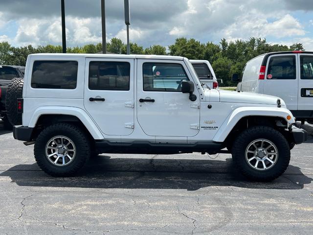 Used 2015 Jeep Wrangler Unlimited Sahara with VIN 1C4BJWEG2FL658764 for sale in Springfield, IL