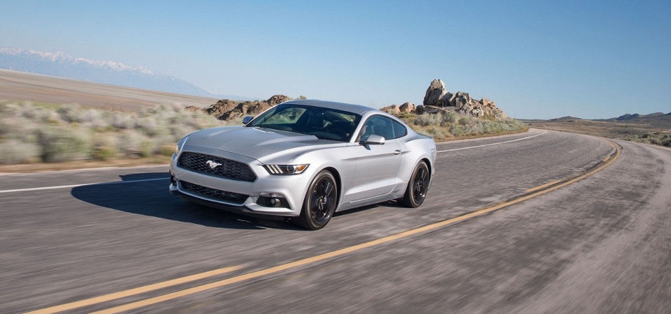2017 Ford Mustang speeding along a highway