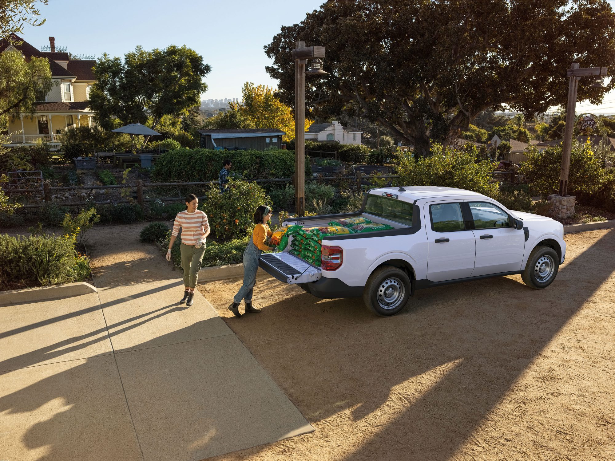 Family and white truck