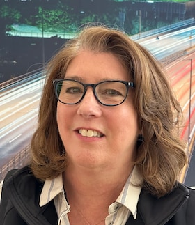 Staff member Peg Cologgi from 8b704659a97c