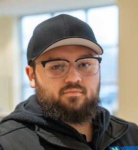 Staff member Brayden Loria from 8b704659a97c