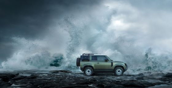 Defender 90 by the ocean