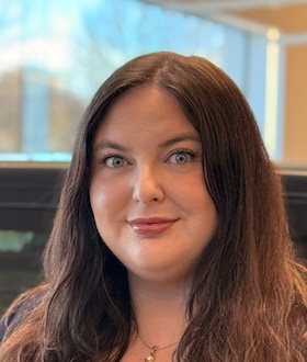 Staff member Kayla McMahan from c03c783a86ee