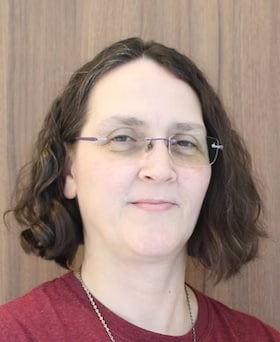 Staff member Anna Dubois from ID_e38c25