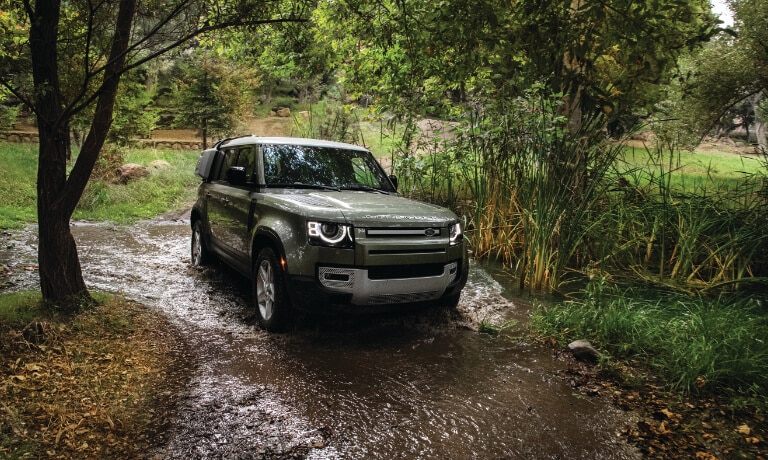 2020 Land Rover Defender Driving Through River