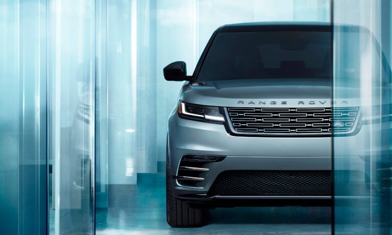 2026 Range Rover Velar head on in blue room