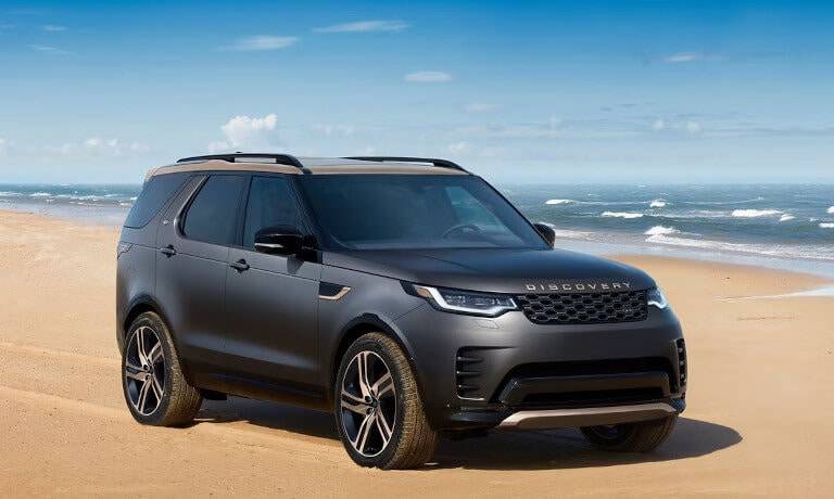 2026 Land Rover Discovery parked on beach