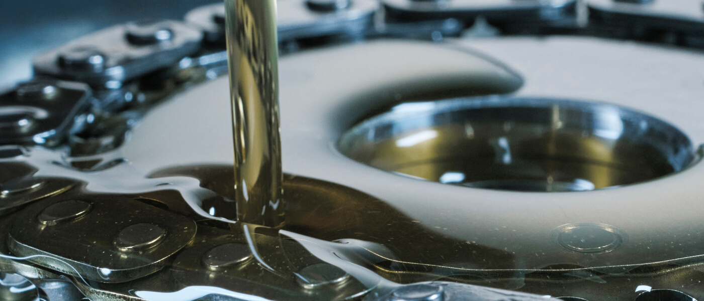 Oil being poured onto chain