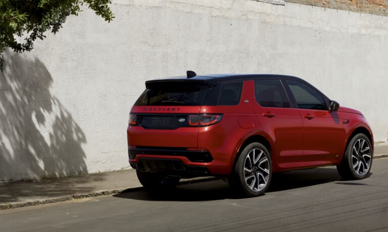 2025 Land Rover Discovery Sport parked by a wall