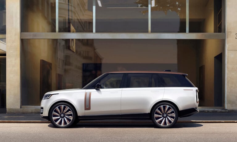 2026 Range Rover side view outside a building