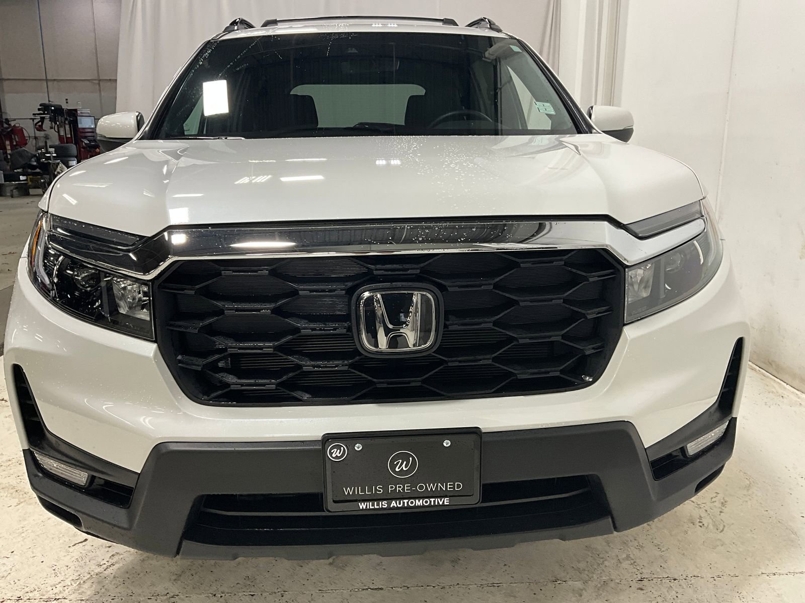 Used 2022 Honda Passport EX-L with VIN 5FNYF8H58NB005620 for sale in Des Moines, IA