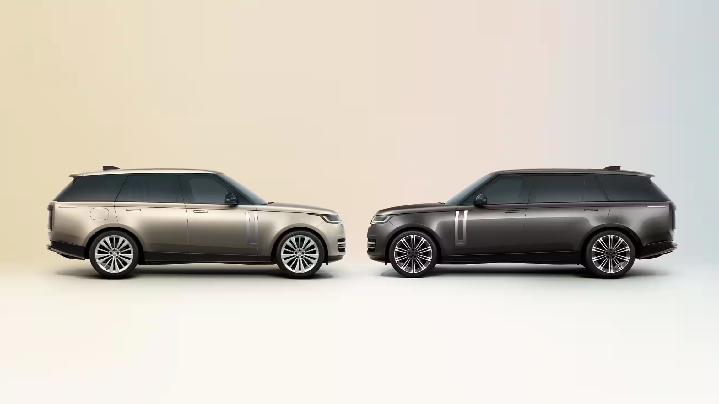Side view of two Range Rovers, one Standard and one Long Wheelbase, facing each other