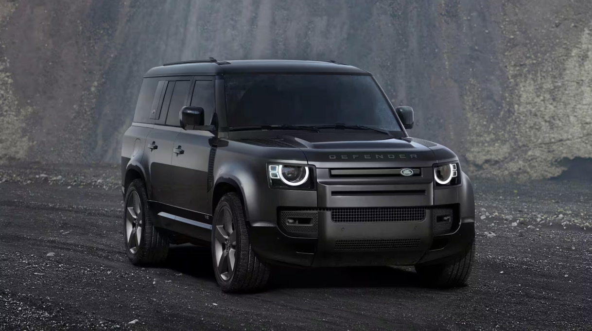 Front view of 2024 Defender 130 on a dirt road
