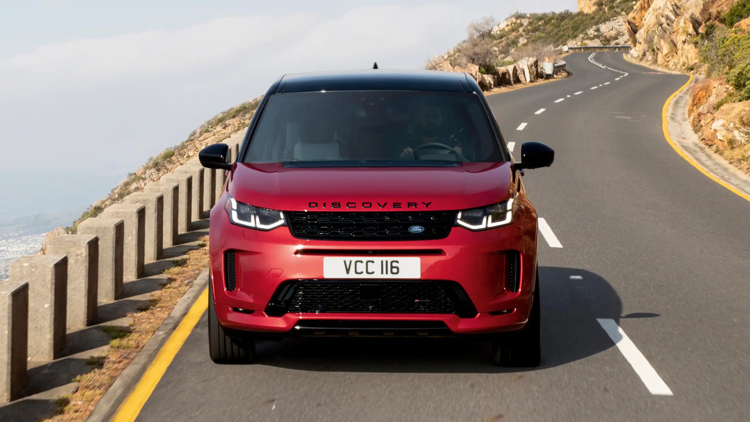 2023-land-rover-discovery-sport-front-road.png