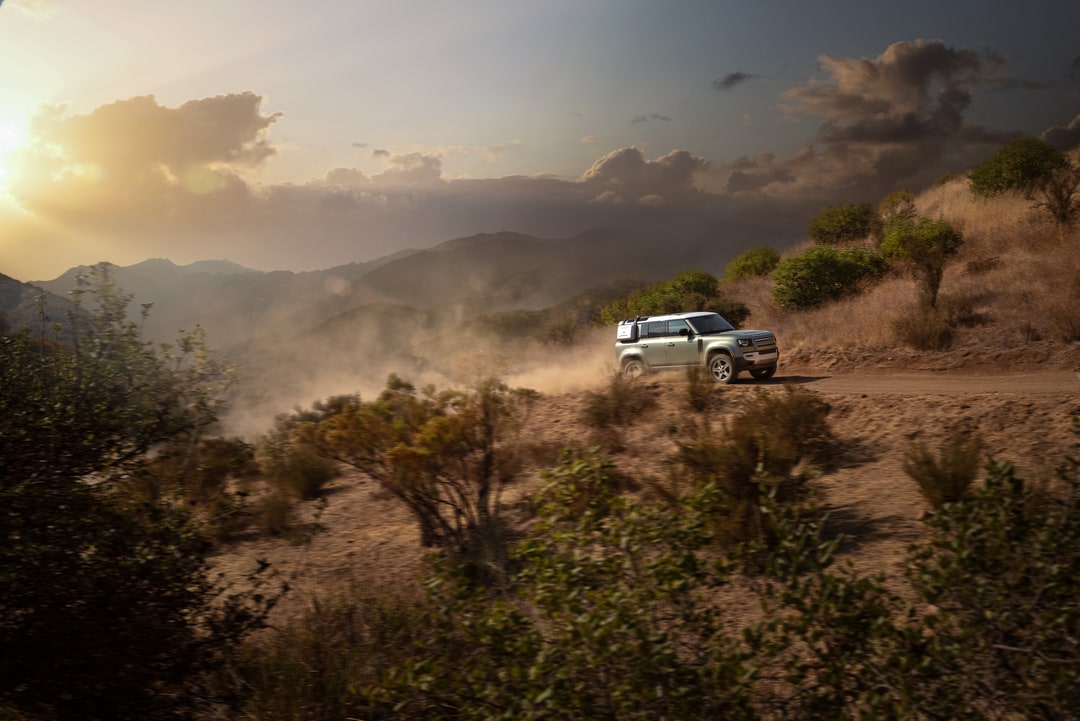  Person cheerfully signing documents.
