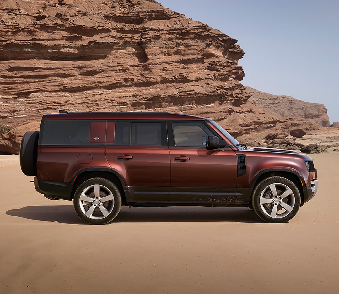  Person cheerfully signing documents.