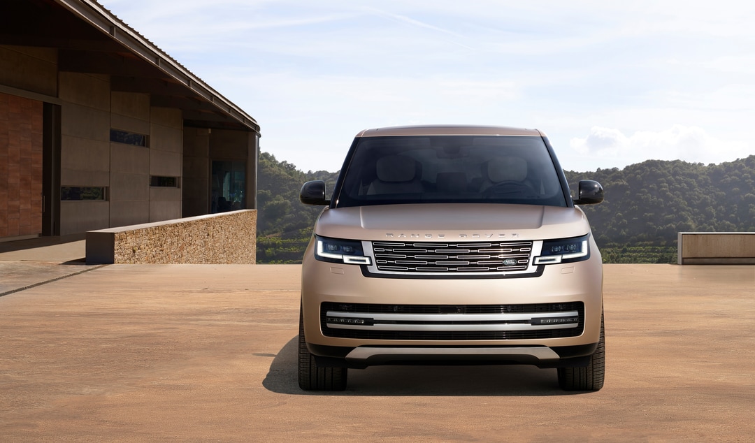  Person cheerfully signing documents.