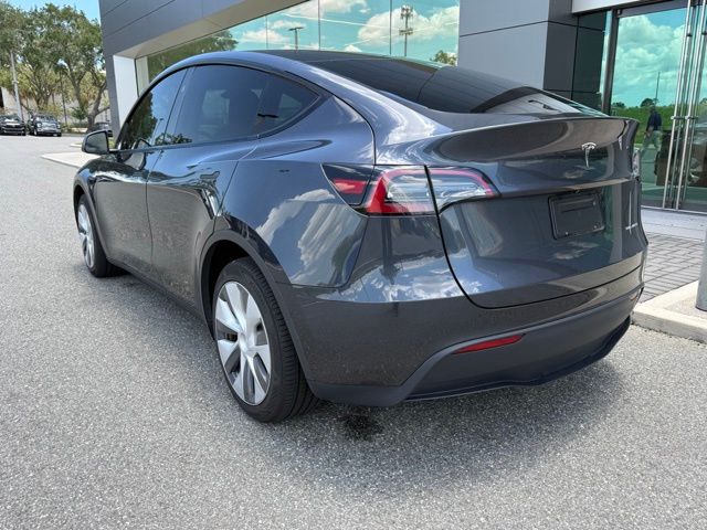 Used 2024 Tesla Model Y Long Range with VIN 7SAYGDEE6RA247855 for sale in Lakeland, FL