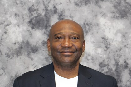 Staff member Arthur Okosi from ID_7292ec