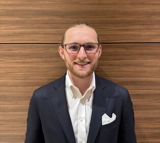 Staff member Andrew Gilkes from ID_318964a7ac48