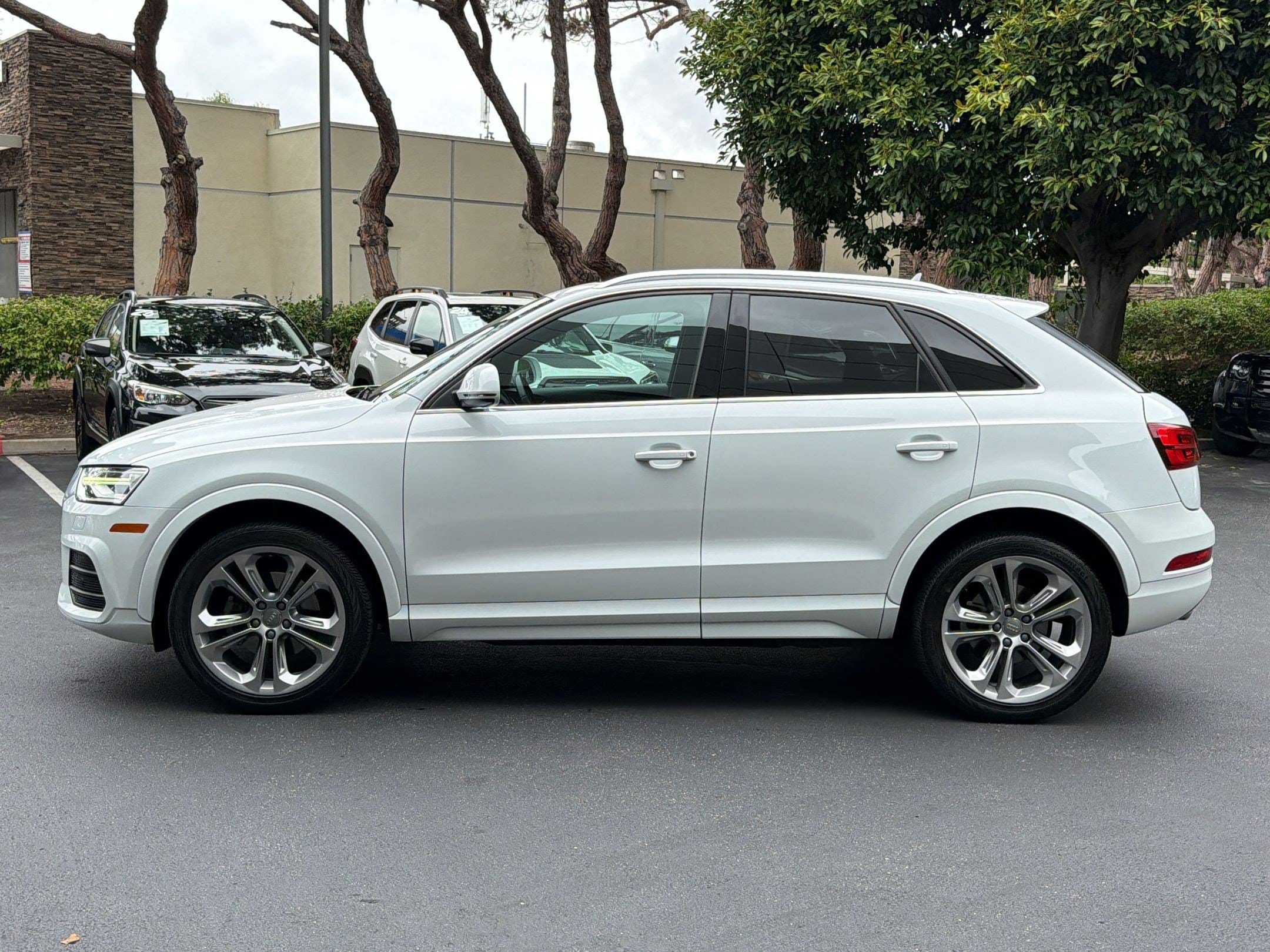 Used 2016 Audi Q3 Premium Plus with VIN WA1EFCFS5GR012143 for sale in Newport Beach, CA