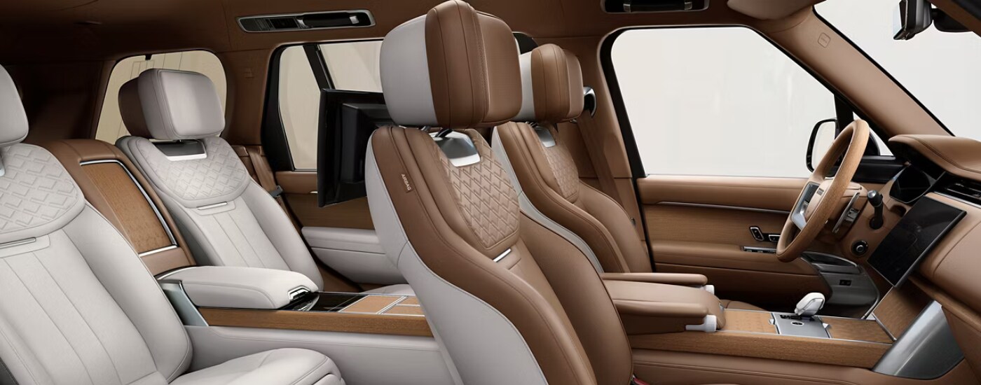 Brown and white leather interior of a 2026 Range Rover