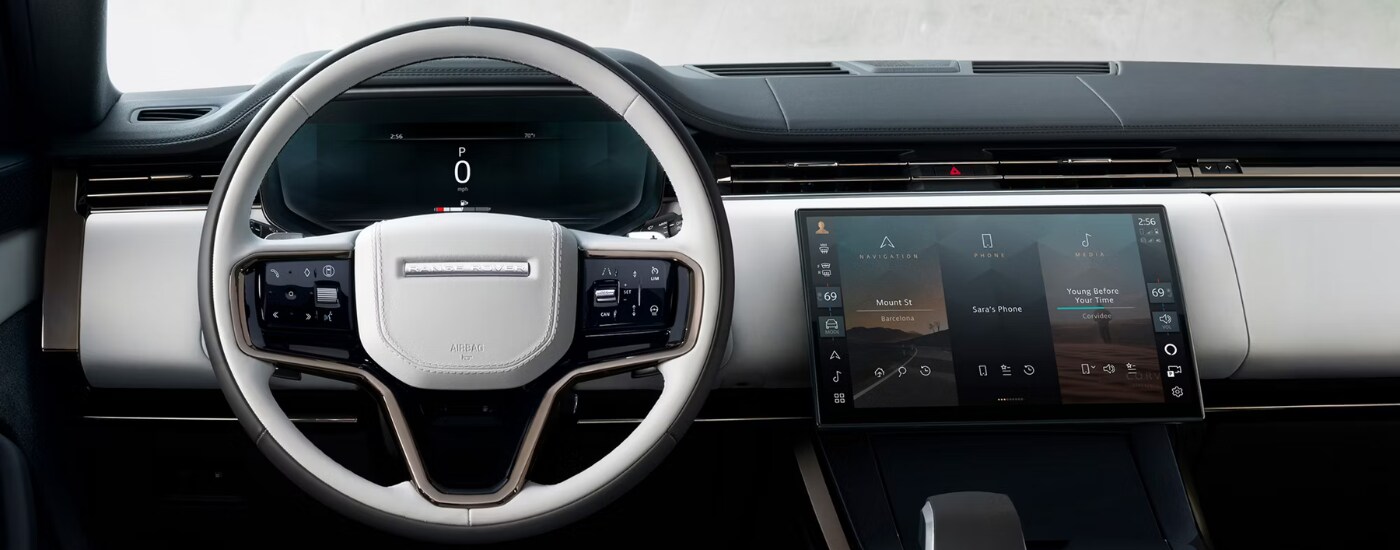White and black interior of a 2026 Range Rover Sport