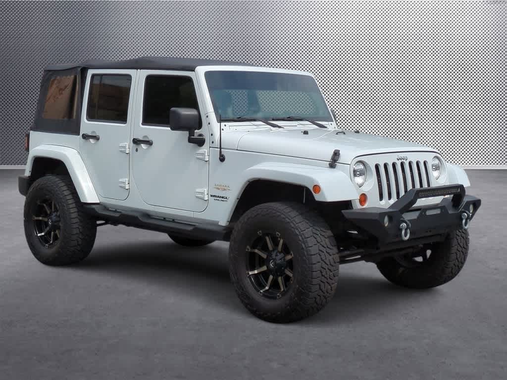 Used 2013 Jeep Wrangler Unlimited Sahara with VIN 1C4BJWEG4DL625004 for sale in Orlando, FL