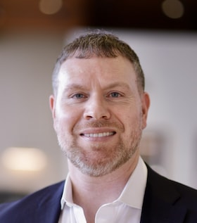 Staff member Travis McCarthy from 13d274a93329