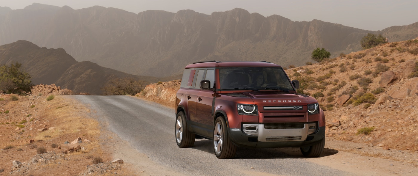 Land Rover Defender 130 on rocky ridge