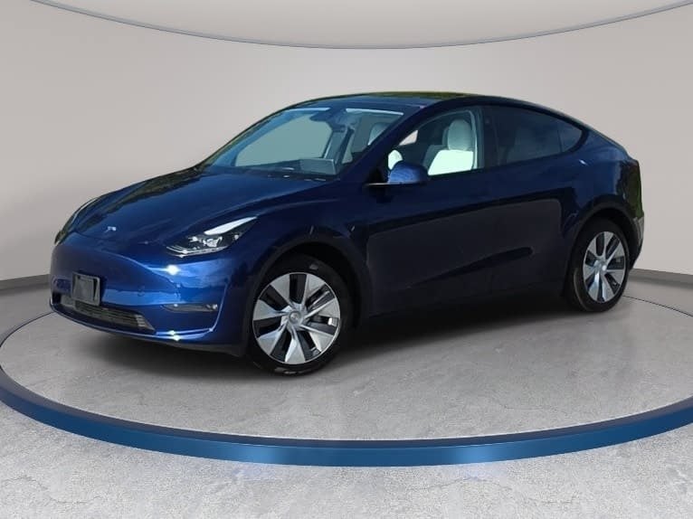 Used 2024 Tesla Model Y Long Range with VIN 7SAYGDEE3RA235484 for sale in Raleigh, NC